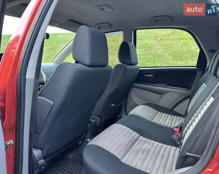 Помаранчевий Сузукі СХ4, об'ємом двигуна 1.6 л та пробігом 202 тис. км за 7200 $, фото 31 на Automoto.ua