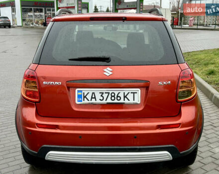 Помаранчевий Сузукі СХ4, об'ємом двигуна 1.6 л та пробігом 240 тис. км за 7500 $, фото 5 на Automoto.ua