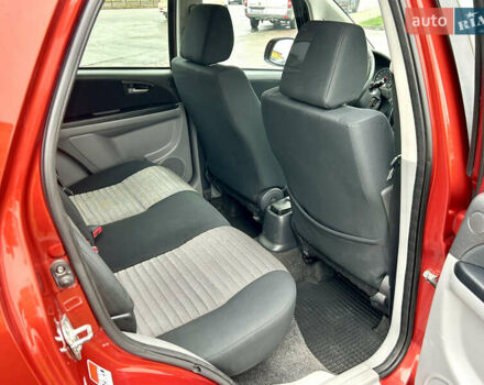 Помаранчевий Сузукі СХ4, об'ємом двигуна 1.6 л та пробігом 240 тис. км за 7500 $, фото 30 на Automoto.ua