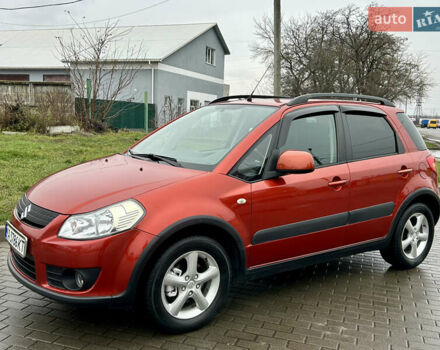 Помаранчевий Сузукі СХ4, об'ємом двигуна 1.6 л та пробігом 240 тис. км за 7500 $, фото 9 на Automoto.ua