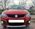 Оранжевый Сузуки СХ4, объемом двигателя 1.6 л и пробегом 92 тыс. км за 7000 $, фото 2 на Automoto.ua