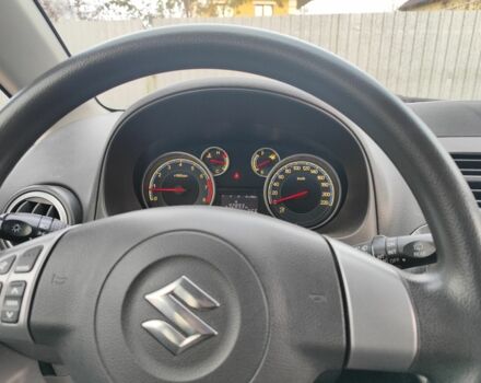 Оранжевый Сузуки СХ4, объемом двигателя 1.6 л и пробегом 92 тыс. км за 7000 $, фото 3 на Automoto.ua