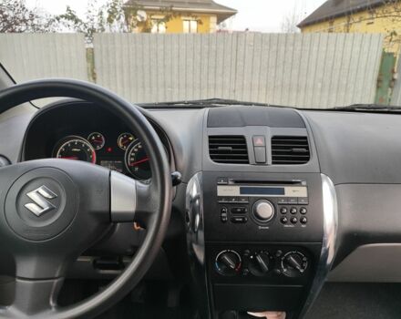 Оранжевый Сузуки СХ4, объемом двигателя 1.6 л и пробегом 92 тыс. км за 7000 $, фото 4 на Automoto.ua