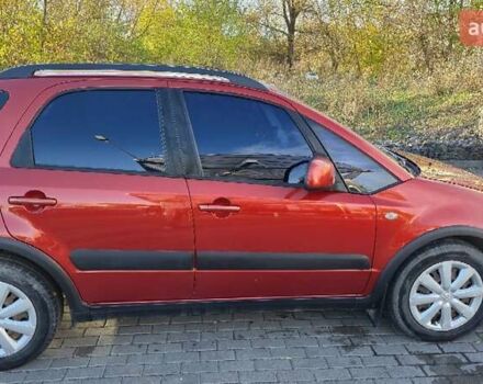 Помаранчевий Сузукі СХ4, об'ємом двигуна 1.6 л та пробігом 68 тис. км за 9000 $, фото 4 на Automoto.ua