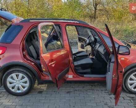 Помаранчевий Сузукі СХ4, об'ємом двигуна 1.6 л та пробігом 68 тис. км за 9000 $, фото 9 на Automoto.ua