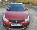 Помаранчевий Сузукі СХ4, об'ємом двигуна 1.6 л та пробігом 68 тис. км за 9000 $, фото 1 на Automoto.ua