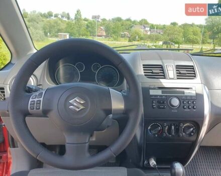 Помаранчевий Сузукі СХ4, об'ємом двигуна 1.59 л та пробігом 226 тис. км за 8000 $, фото 14 на Automoto.ua