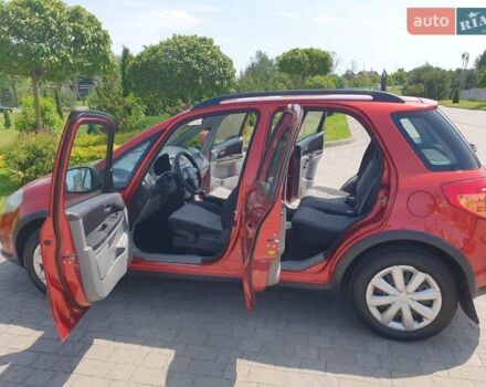 Помаранчевий Сузукі СХ4, об'ємом двигуна 1.59 л та пробігом 226 тис. км за 8000 $, фото 16 на Automoto.ua