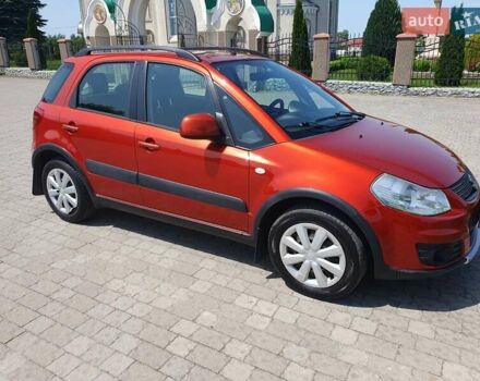 Помаранчевий Сузукі СХ4, об'ємом двигуна 1.59 л та пробігом 226 тис. км за 8000 $, фото 1 на Automoto.ua