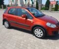 Помаранчевий Сузукі СХ4, об'ємом двигуна 1.59 л та пробігом 226 тис. км за 8000 $, фото 1 на Automoto.ua