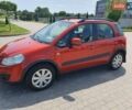 Помаранчевий Сузукі СХ4, об'ємом двигуна 1.59 л та пробігом 226 тис. км за 8000 $, фото 1 на Automoto.ua