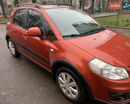 Оранжевый Сузуки СХ4, объемом двигателя 1.59 л и пробегом 105 тыс. км за 9200 $, фото 2 на Automoto.ua