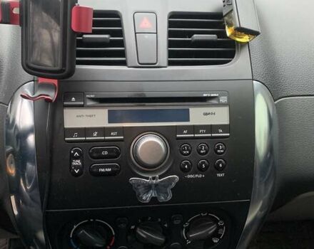 Оранжевый Сузуки СХ4, объемом двигателя 1.59 л и пробегом 105 тыс. км за 9200 $, фото 16 на Automoto.ua