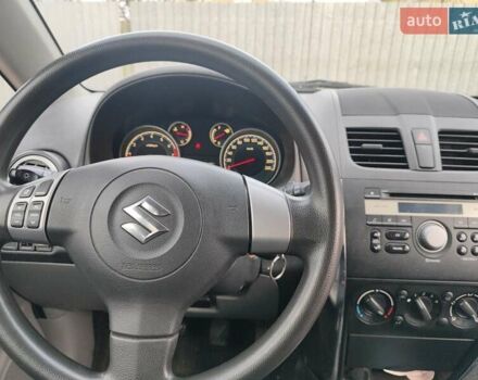 Оранжевый Сузуки СХ4, объемом двигателя 1.59 л и пробегом 92 тыс. км за 7000 $, фото 3 на Automoto.ua