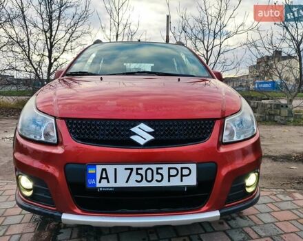 Оранжевый Сузуки СХ4, объемом двигателя 1.59 л и пробегом 92 тыс. км за 7000 $, фото 2 на Automoto.ua