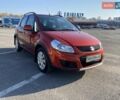 Оранжевый Сузуки СХ4, объемом двигателя 1.6 л и пробегом 150 тыс. км за 8800 $, фото 1 на Automoto.ua