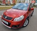 Помаранчевий Сузукі СХ4, об'ємом двигуна 1.6 л та пробігом 88 тис. км за 11200 $, фото 1 на Automoto.ua