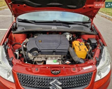 Помаранчевий Сузукі СХ4, об'ємом двигуна 1.6 л та пробігом 88 тис. км за 11200 $, фото 82 на Automoto.ua