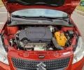 Помаранчевий Сузукі СХ4, об'ємом двигуна 1.6 л та пробігом 88 тис. км за 11200 $, фото 82 на Automoto.ua