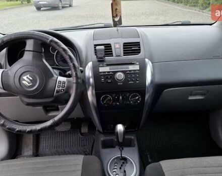 Оранжевый Сузуки СХ4, объемом двигателя 1.6 л и пробегом 85 тыс. км за 11200 $, фото 4 на Automoto.ua