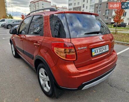 Помаранчевий Сузукі СХ4, об'ємом двигуна 1.6 л та пробігом 88 тис. км за 11200 $, фото 17 на Automoto.ua