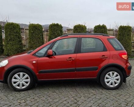 Оранжевый Сузуки СХ4, объемом двигателя 1.6 л и пробегом 85 тыс. км за 11200 $, фото 1 на Automoto.ua