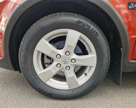 Помаранчевий Сузукі СХ4, об'ємом двигуна 1.6 л та пробігом 88 тис. км за 11200 $, фото 27 на Automoto.ua