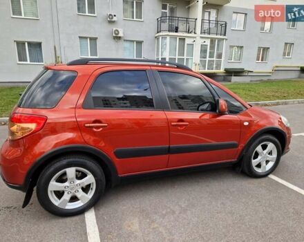 Помаранчевий Сузукі СХ4, об'ємом двигуна 1.6 л та пробігом 88 тис. км за 11200 $, фото 18 на Automoto.ua