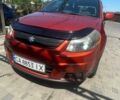 Оранжевый Сузуки СХ4, объемом двигателя 2 л и пробегом 250 тыс. км за 7900 $, фото 1 на Automoto.ua