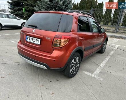 Оранжевый Сузуки СХ4, объемом двигателя 1.59 л и пробегом 136 тыс. км за 9900 $, фото 5 на Automoto.ua