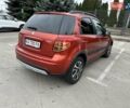 Оранжевый Сузуки СХ4, объемом двигателя 1.59 л и пробегом 136 тыс. км за 9900 $, фото 5 на Automoto.ua