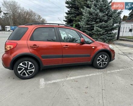 Оранжевый Сузуки СХ4, объемом двигателя 1.59 л и пробегом 136 тыс. км за 9900 $, фото 2 на Automoto.ua