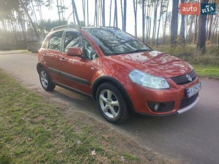 Оранжевый Сузуки СХ4, объемом двигателя 1.6 л и пробегом 202 тыс. км за 6100 $, фото 1 на Automoto.ua