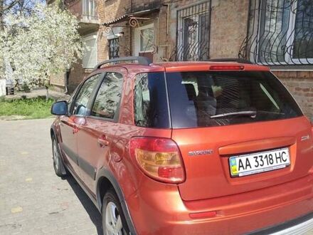 Помаранчевий Сузукі СХ4, об'ємом двигуна 1.59 л та пробігом 172 тис. км за 7600 $, фото 1 на Automoto.ua