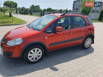 Помаранчевий Сузукі СХ4, об'ємом двигуна 1.59 л та пробігом 226 тис. км за 8000 $, фото 1 на Automoto.ua