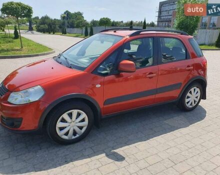 Оранжевый Сузуки СХ4, объемом двигателя 1.59 л и пробегом 226 тыс. км за 8000 $, фото 1 на Automoto.ua