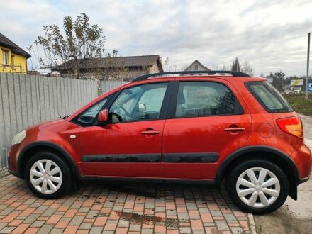 Оранжевый Сузуки СХ4, объемом двигателя 1.6 л и пробегом 92 тыс. км за 7000 $, фото 1 на Automoto.ua