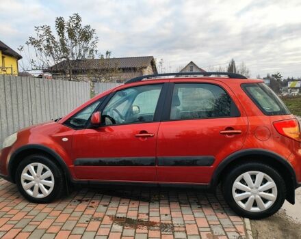 Оранжевый Сузуки СХ4, объемом двигателя 1.6 л и пробегом 92 тыс. км за 7000 $, фото 1 на Automoto.ua
