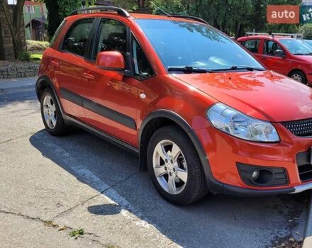 Оранжевый Сузуки СХ4, объемом двигателя 1.6 л и пробегом 88 тыс. км за 6900 $, фото 1 на Automoto.ua