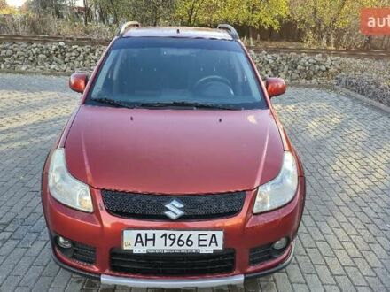 Помаранчевий Сузукі СХ4, об'ємом двигуна 1.6 л та пробігом 68 тис. км за 9000 $, фото 1 на Automoto.ua