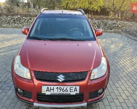 Помаранчевий Сузукі СХ4, об'ємом двигуна 1.6 л та пробігом 68 тис. км за 9000 $, фото 1 на Automoto.ua