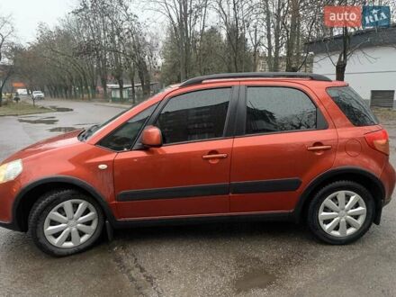 Помаранчевий Сузукі СХ4, об'ємом двигуна 1.59 л та пробігом 105 тис. км за 9200 $, фото 1 на Automoto.ua