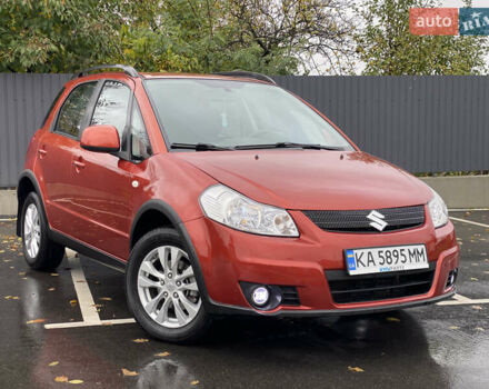 Оранжевый Сузуки СХ4, объемом двигателя 2 л и пробегом 180 тыс. км за 8700 $, фото 1 на Automoto.ua