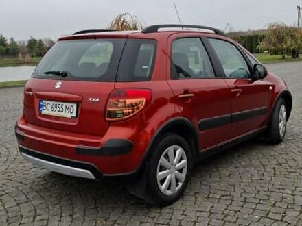 Помаранчевий Сузукі СХ4, об'ємом двигуна 1.6 л та пробігом 85 тис. км за 11200 $, фото 1 на Automoto.ua