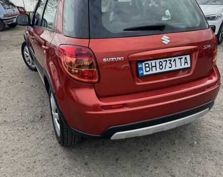 Помаранчевий Сузукі СХ4, об'ємом двигуна 1.59 л та пробігом 78 тис. км за 11000 $, фото 1 на Automoto.ua