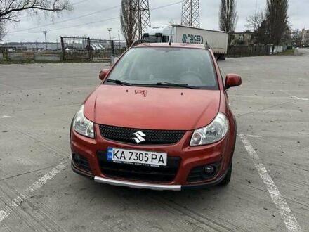 Оранжевый Сузуки СХ4, объемом двигателя 1.59 л и пробегом 136 тыс. км за 9900 $, фото 1 на Automoto.ua