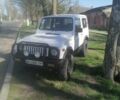 Білий Сузукі Самурай, об'ємом двигуна 1 л та пробігом 157 тис. км за 4000 $, фото 1 на Automoto.ua