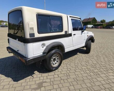 Белый Сузуки Самурай, объемом двигателя 1.3 л и пробегом 95 тыс. км за 7500 $, фото 2 на Automoto.ua