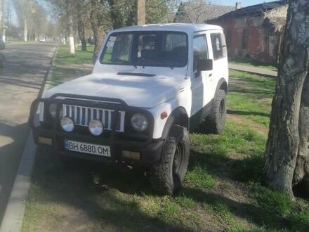 Білий Сузукі Самурай, об'ємом двигуна 1 л та пробігом 157 тис. км за 4000 $, фото 1 на Automoto.ua