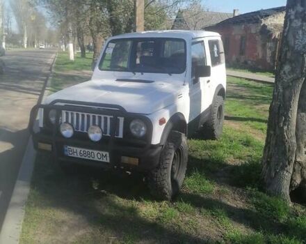 Белый Сузуки Самурай, объемом двигателя 1 л и пробегом 157 тыс. км за 4000 $, фото 1 на Automoto.ua